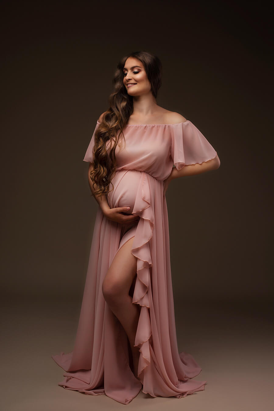 Light brown haired model photographed in the studio wearing Mii-Estilo&