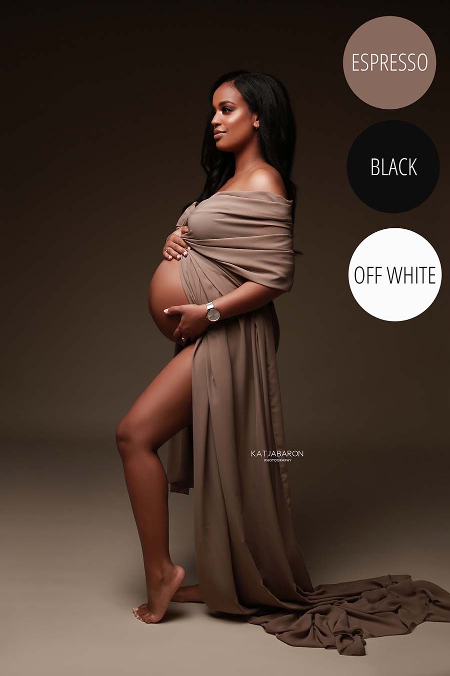 pregnant model poses in a studio wearing a draping fabric made of chiffon in espresso color. the scarf is wrapped around her arms. her belly and legs can still be seen while the model poses on her side and looks away.
