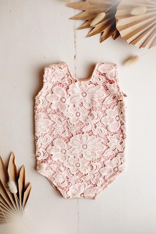 Photo shows the front side of the Bellerose Baby Girl romper - an outfit for baby&