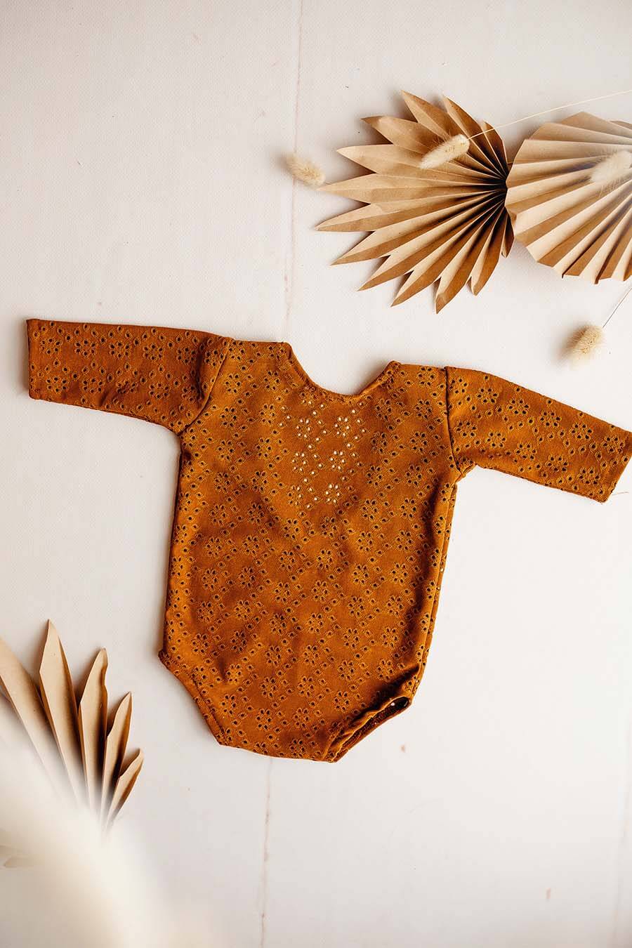This is a product photo of the Lilou Romper Cognac. 