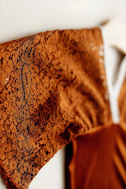 This is a close up photograph of the linden romper cognac
