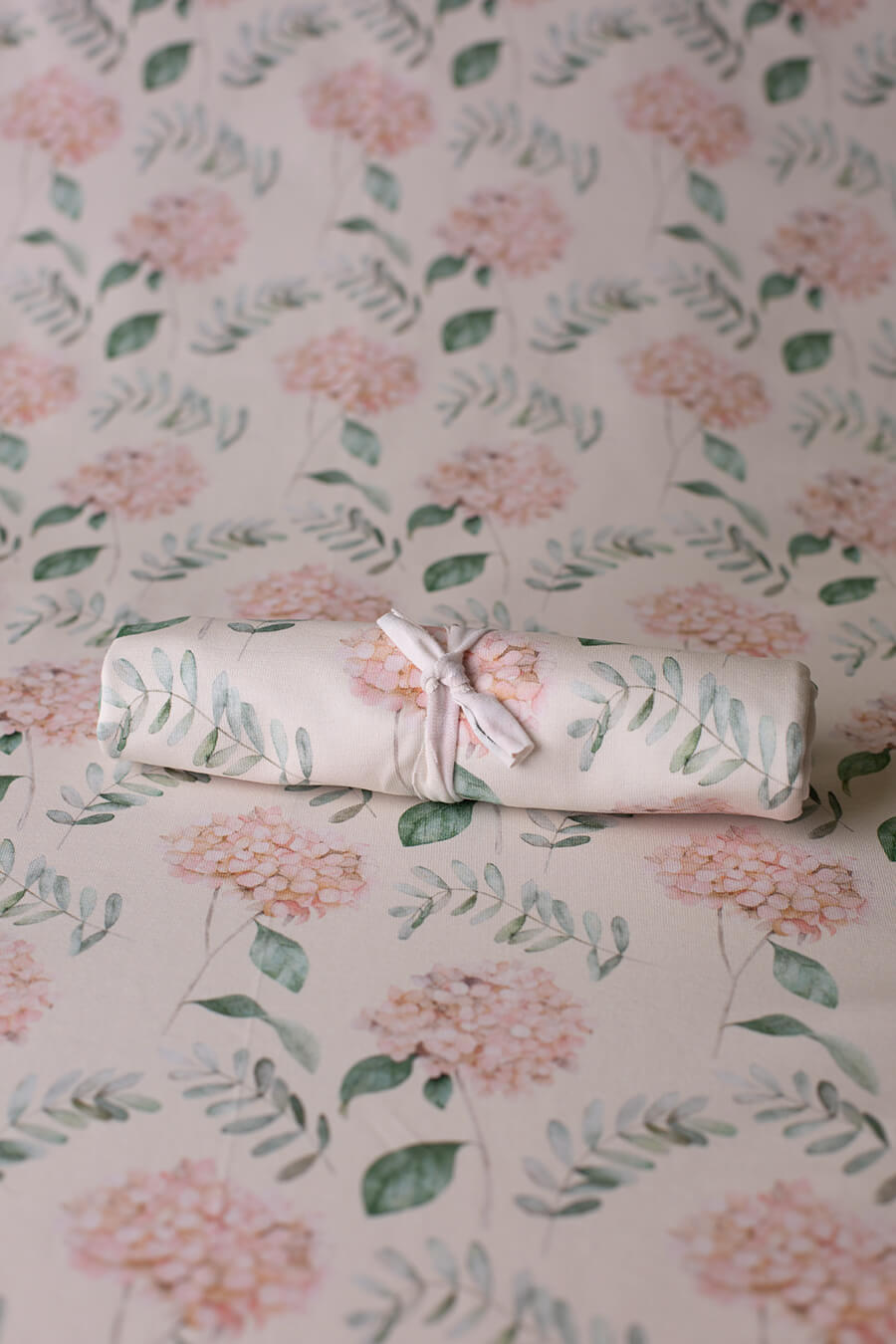 display photo of a newborn backdrop in flower patterns for newborn sessions.