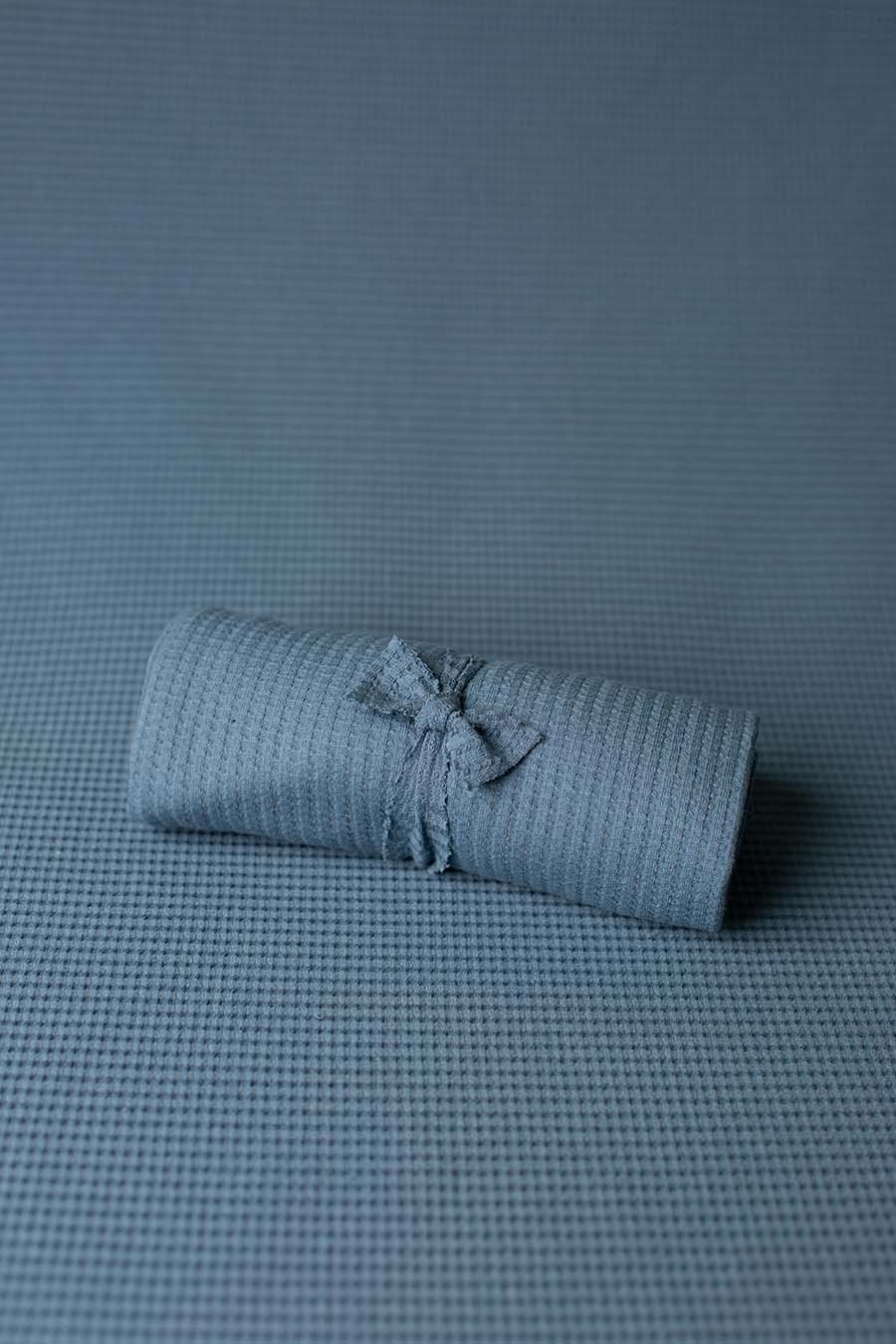 display photo of a newborn backdrop in denim color for newborn sessions.