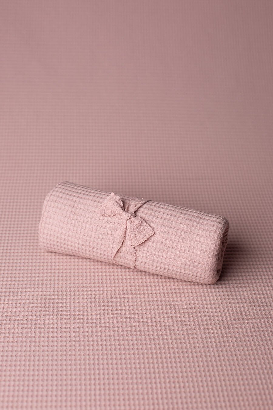 display photo of a newborn backdrop in dusty muave color for newborn sessions.